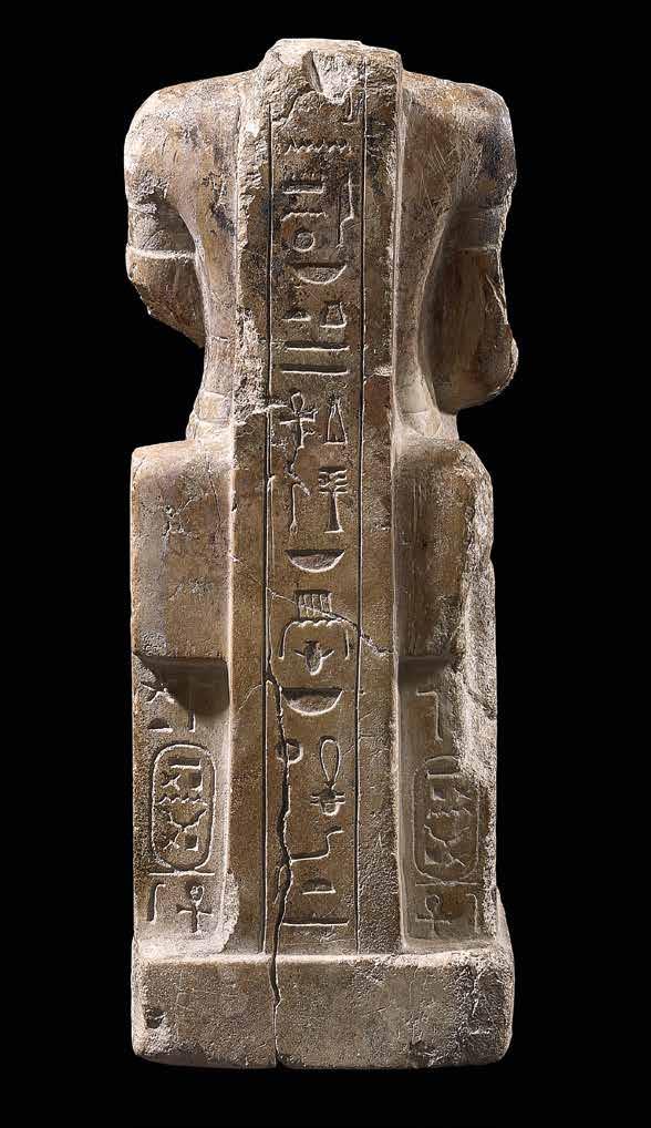 Seated statue of Amun Limestone with incised
