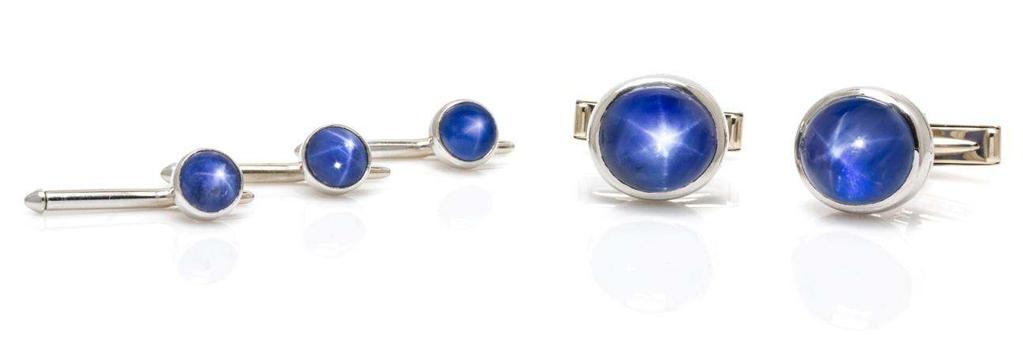 Lot 408 A Fine Platinum, White Gold and Star Sapphire Dress Set, Oscar Heyman Brothers for Spaulding & Company, consisting of a pair of platinum cufflinks containing two oval cabochon cut star