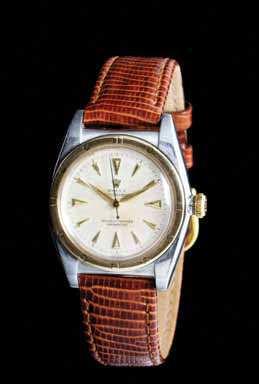 97 A Stainless Steel and 18 Karat Yellow Gold Oyster Perpetual Bubbleback Wristwatch, Rolex, Circa 1945, 40.00 x 32.