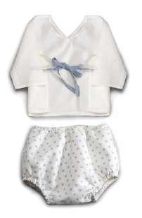 long sleeves and V-neck collar. White nappy cover with star pattern.