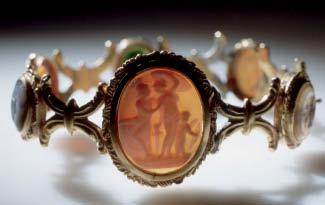 Ancient Roman gold and enamel jewelry A gold and cameo bracelet with figures of Cupid, Athena, and Mercury Ancient Rome In ancient