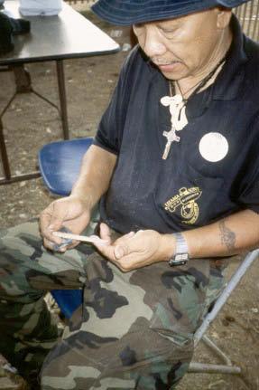 FRANK LIZAMA working on a fishbone carving, 1998 By 1998, bone
