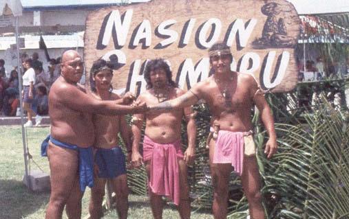 OTHER REASONS FOR CREATING ART NATIONALISM Proud Nasion Chamoru members stand in front of their display booth at the Guam Micronesia Island Fair, 1994.