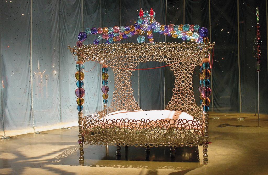 Robb Report Othoniel used Murano glass to create this fourposter bed. they feature loops and arabesques that evoke the body in movement, amplified by water jets.