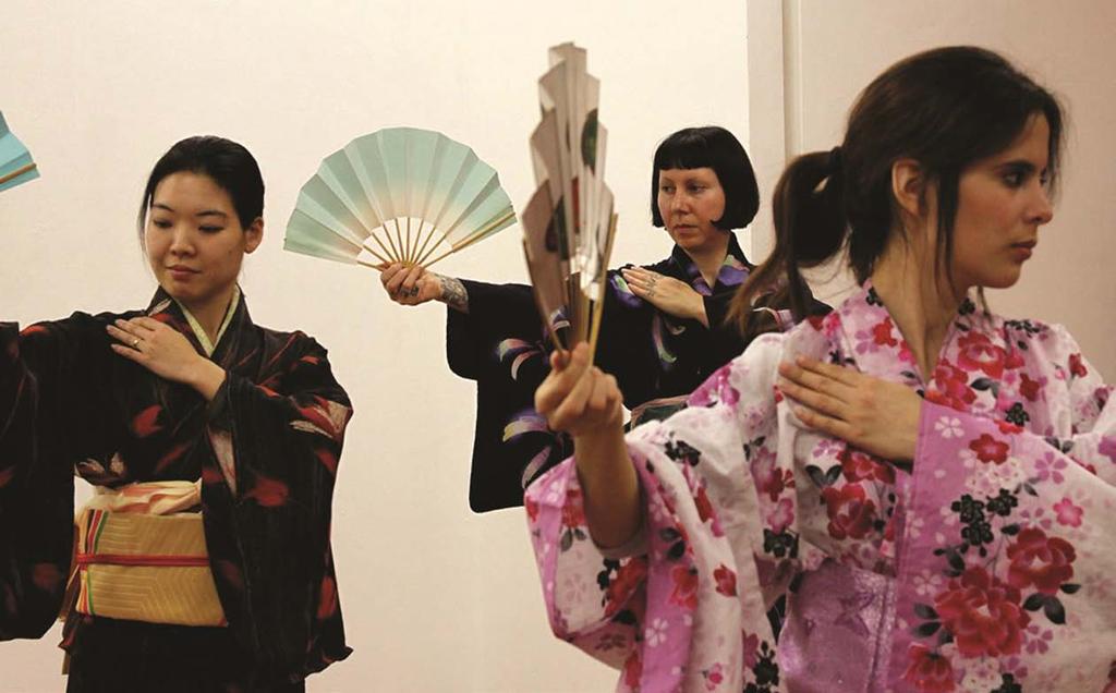 Classes can be taken to learn the traditional Japanese fan dance. The women are wearing traditional Japanese kimonos. Continued from previous page other to create new works of Japanese art.