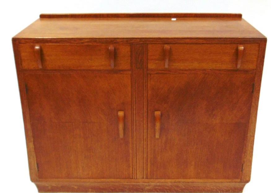 5cm high Lot 377 377 A LARGE BURR WOOD VENEERED TWIN PEDESTAL DESK with tooled leather inset top and two frieze drawers, fitted with three drawers to left