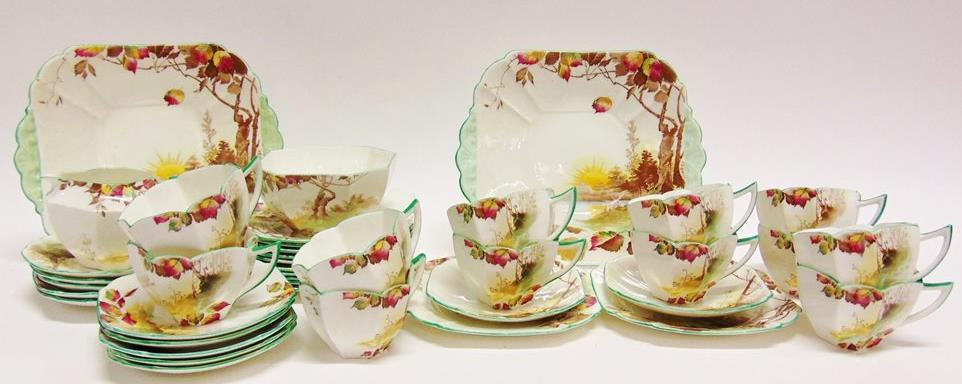 90 AN EXTENSIVE NORITAKE DINNER SERVICE in 'Woodrow' pattern Lot 85 85 A SHELLEY QUEEN ANNE SHAPE TWELVE SETTING TEA SERVICE decorated in the 'Autumn Leaves' pattern, marked to base 'Rd 723404',