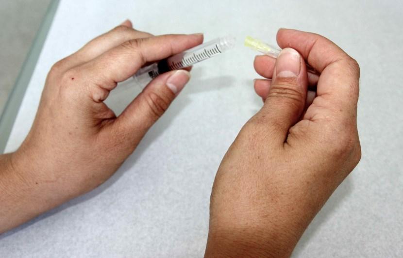 If there are any, point the needle upwards (at a 90 angle) and gently tap your finger against the barrel of the syringe to get the bubbles to the surface, near the base of the needle.