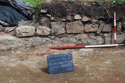 47m OD, but the ground level (within the cloister garth) has not yet been fully excavated. The buttress is almost square and two visible courses survive in places.