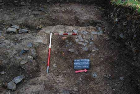 Finola O Carroll C420/E4127 IAFS / Black Friary Excavation After the removal of layer F903, a loose brown soil, clay/loam, F904, containing rubble and slate pieces, which was reasonably compacted and