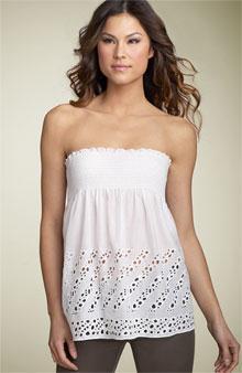 Strapless top made of fabric that is shirred together to form a cylinder