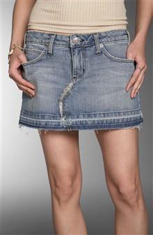 A very short, usually mid-thigh skirt (introduced in l965 as part of