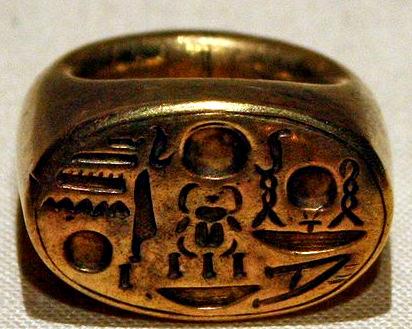 Fig.19 (d) Tutankhamun complex ring [19]. Fig.19 (e) Tutankhamun solid ring [34]. (c) Scorpion bezel Fig.20 Rings of Pharaoh Horemheb [35]. V.