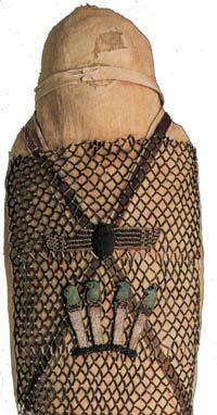 Pectoral scarabs were sewn to the wrappings or the bead net placed on the body of the deceased,