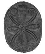 Scarab with cross pattern formed from spirals, concentric circles, and petals.