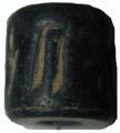 ' Black steatite. Archaic Period. 1.2 X1.2 cm. Portland Art Museum 29.16.40d.