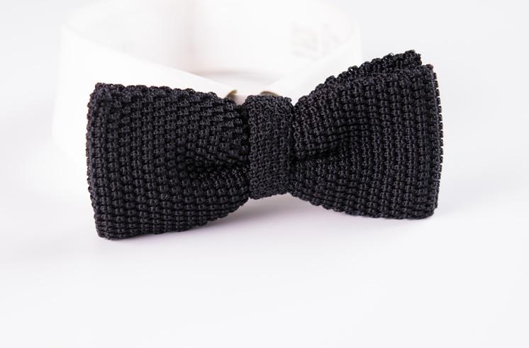 10 MISTAKE # Pre-Tied Bow Ties Wearing a pre-tied bow tie makes you look like a 13-year-old boy at prom, end of story. It looks stiff, cheap and too symmetrical.