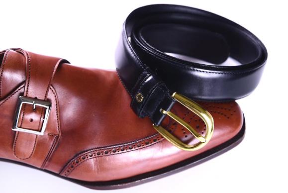 So, black shoes go with a black belt and brown shoes go with a (closely) matching brown belt.