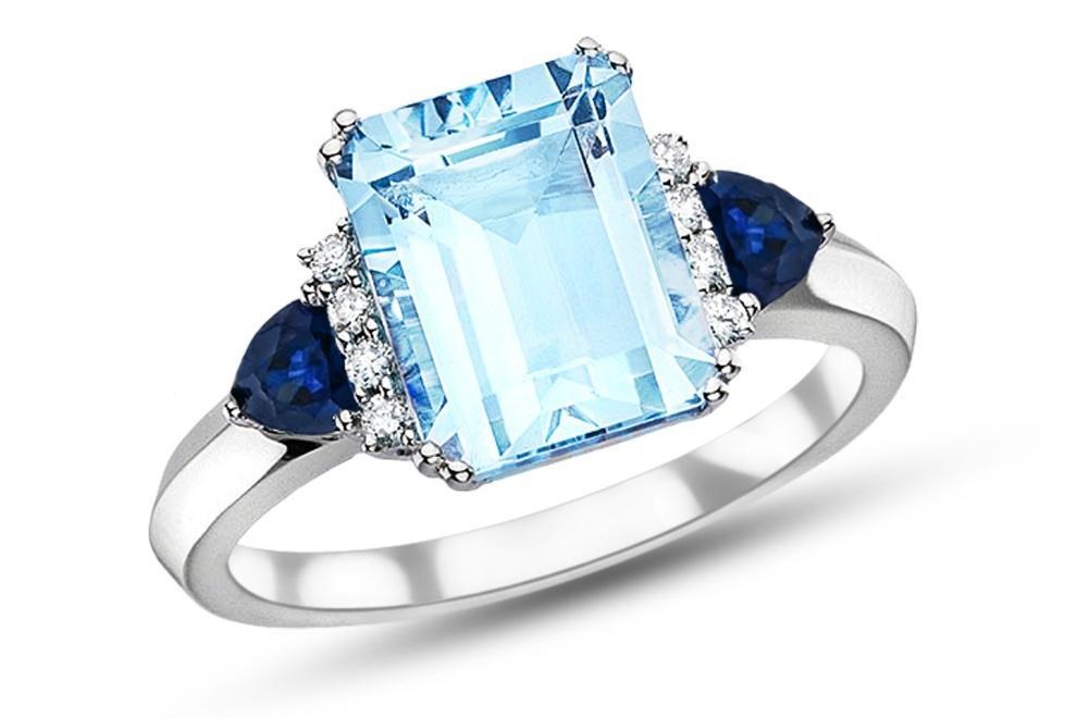 ICE SKY BLUE TOPAZ, SAPPHIRE & DIAMOND RING SET IN WHITE GOLD SKU: RCC 102128 This fairy-tale ring will become an important part of any