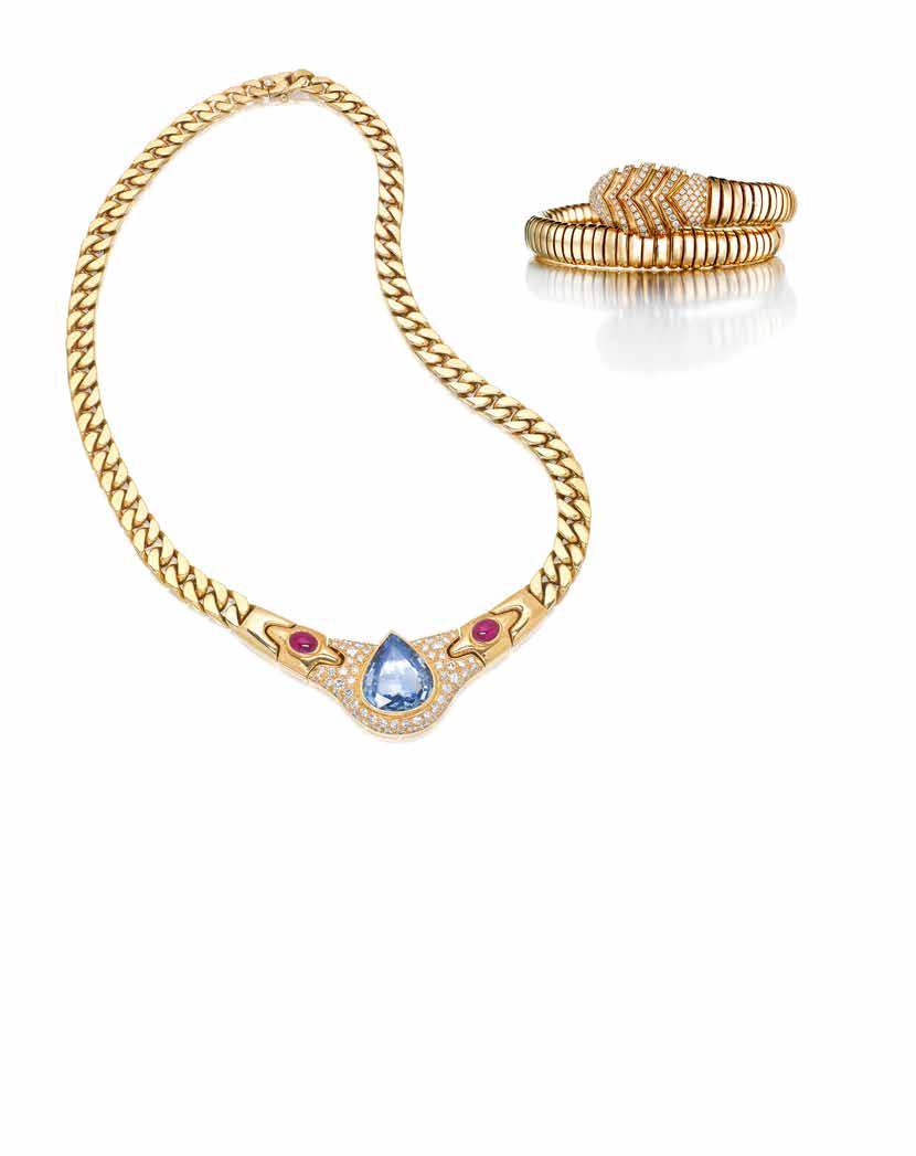 46 45 45 A SAPPHIRE, RUBY, DIAMOND AND 18K GOLD NECKLACE, BVLGARI, ITALIAN set to the front with a pear-shaped sapphire, weighing 13.