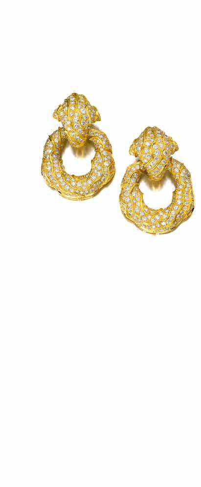 55 56 PROPERTY FROM A CALIFORNIA ESTATE 55 A PAIR OF DIAMOND AND 18K GOLD EARRINGS of doorknocker design, pavé-set with round