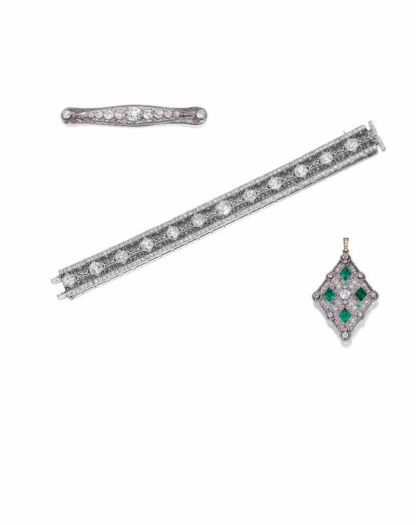 3 4 5 3 AN ANTIQUE PLATINUM AND DIAMOND BAR PIN, CIRCA 1910 of filigree design, centrally highlighting a row of millegrain-set old European-cut diamonds, the largest weighing approximately 1.