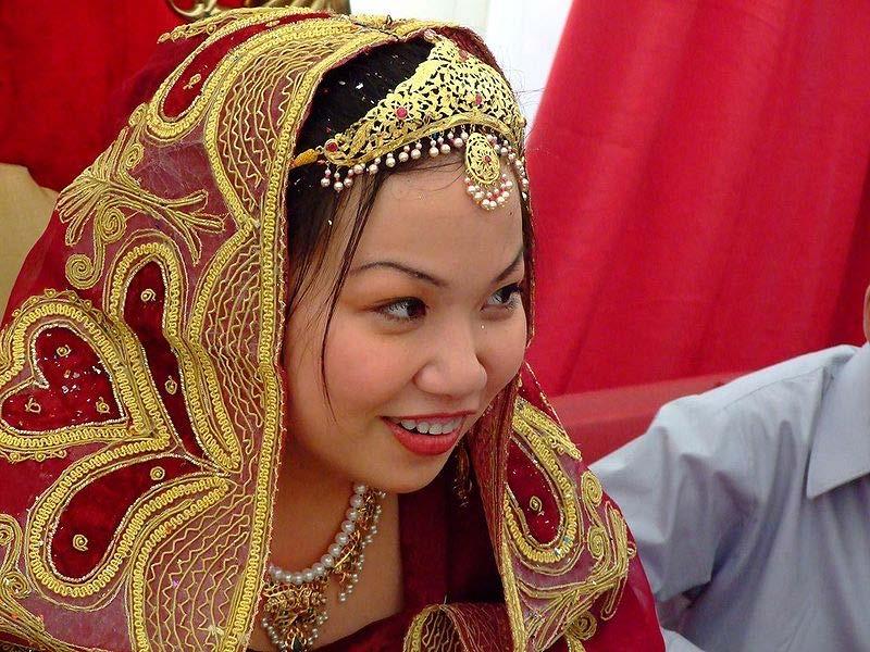 Bride at a Nikah ceremony wearing typical