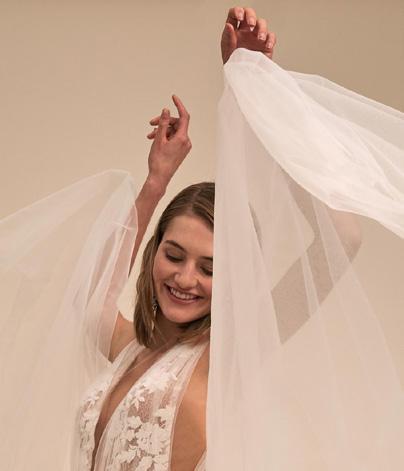 Liz Martinez French-Israeli designer Liz Martinez designs and constructs all of her gowns with a team of experts in her