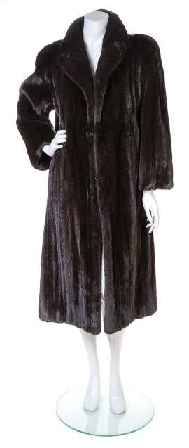 47 49 47 A Reversible Brown Mink Lined Coat, with a hood, decorative front button closure and slip pockets. Unlabeled. No size.