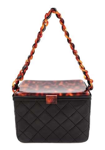 $1,500-2,500 68 71 A Chanel Black Leather Quilted Box Bag, 1996-1997, with a faux tortoiseshell top lid, a faux