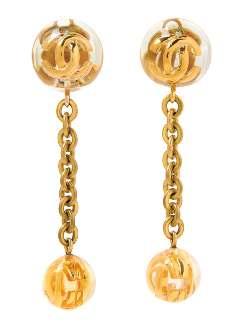 97 90 A Pair of Chanel Lucite Drop Earclips, 1990, with decorative goldtone logo