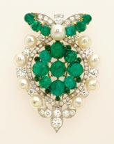 54/52481 1934 Cabochon emeralds, diamonds, pearls, gold, platinum H: 2 ⁷/₁₆