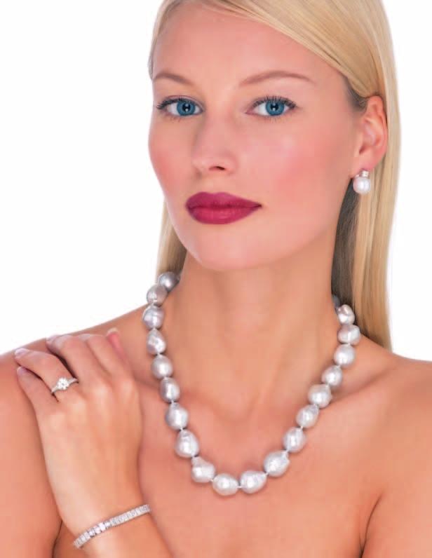 27 A single strand South Sea cultured pearl necklace. Composed of 25 graduated baroque shape cultured pearls measuring approximately from 14.