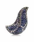 $2,000-3,000 142 A Pair of 18 Karat White Gold, Sapphire and Diamond Earclips, possibly by David Morris, in a lame motif, containing 116 pave set round brilliant cut diamonds weighing