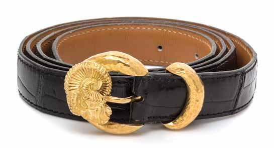 152 155 150 150 An 18 Karat Yellow Gold and Ram s Head Belt, David Webb, consisting of a hammered gold ram s head motif buckle,