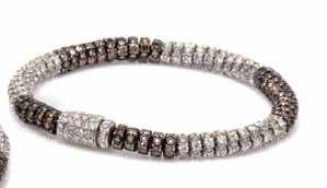 177 176 175 175 An 18 Karat White Gold, Colored Diamond and Diamond Necklace, consisting of 15 alternating sections, eight of which are black rhodium plated and contain 640 round brilliant cut brown