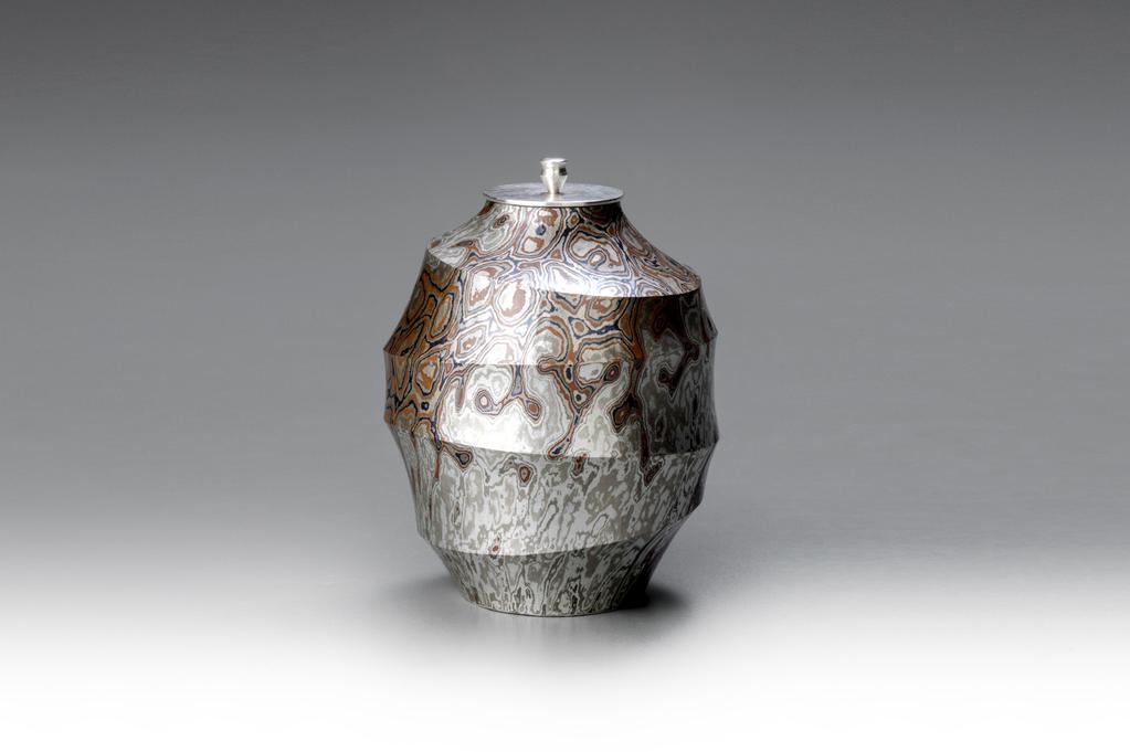 Mokume-gane Tea Caddy 02, 2017; silver, copper, shakudō and shibuichi; h. 3 3/4 x dia. 2 7/8 in. (9.6 x 7.2 cm) Fukiwake Round Flower Vase, 2016; metal casting with kuromido, brass and copper h.
