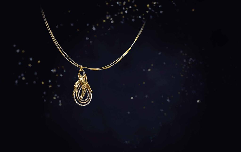 This yellow gold pendant captures the ballerina in movement.