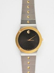 1245 MOVADO Steel man s wristwatch, round black dial, quartz movement, steel bracelet with folding