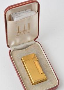 1258 CARTIER Plated gold gas lighter signed «Cartier Paris», made in Switzerland. Weight : 75,4g.