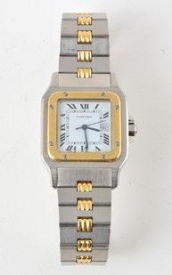 1261 CARTIER - SANTOS GOLD, STEEL AND SAPPHIRE Man s yellow gold and steel wristwatch, white dial with Roman numerals, date at 3, the winding crown set with a sapphire, automatic mouvement, steel and