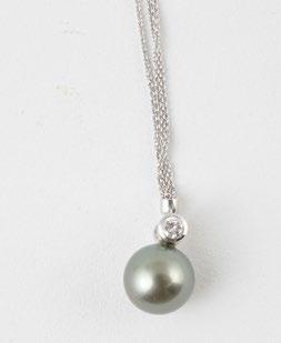 1073, TAHITIAN PEARL AND DIAMOND 14K white gold pendant (marked) adorned with a Tahitian pearl