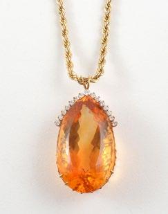 1103 CITRINE AND Pendant set with one pearshape cut citrine surrounded by fifteen (15) brilliant