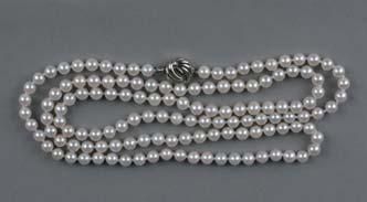 Lot 35 Lot 32 Lot 32 A MODERN ROPE OF CULTURED PEARLS, uniform in size measuring on average 6.