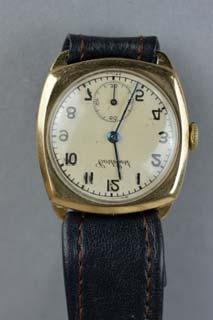 Lot 58 Lot 58 AN EARLY 20TH CENTURY GENTS 9CT GOLD WRISTWATCH, dial signed Cortebert, second sweep subsidiary dial at 6 o clock position, cushion shape