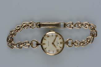 mechanical jewelled movement, fitted to a bark finish (non-original) 9ct bracelet, bracelet measuring 190mm in length, fitted to a fold over clasp