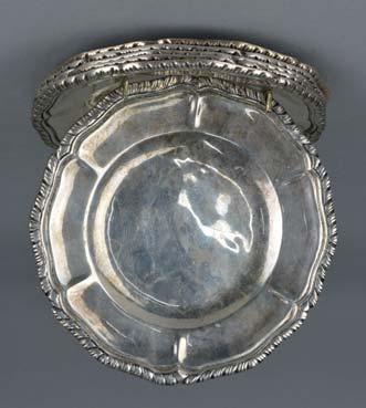 Lot 145 Lot 143 Lot 145 A MEXICAN SILVER WINE TASTER, of circular form, the applied wavy handle engraved with a bird by a fence, the bowl with a scene of farmyard animals, the base stamped