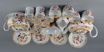 Lot 191 Lot 191 AN EARLY 19TH CENTURY WEDGWOOD BONE CHINA PART TEA AND COFFEE SERVICE, printed and painted with an Imari design, gilt details, comprising teapot and cover, twin