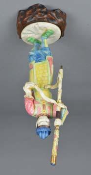Lot 260 Lot 260 A LATE 19TH CENTURY JAPANESE IVORY OKIMONO, of a male figure holding a ceremonial staff, painted/stained decoration with gilt and gilt