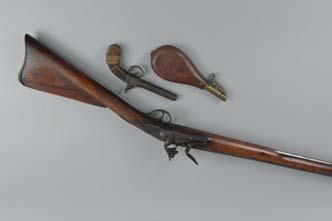 Lot 349 Lot 349 AN ANTIQUE 26 BORE PERCUSSION SIDE BY SIDE SHOTGUN, fitted with 24 1/2 barrels, its metal work rusted overall, the locks bear a spurious Military Crown mark and a cyrillic name, both